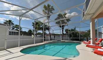 Swimming pool receives full sunshine from dawn until dusk. Only You Florida Villa. Highlands Reserve Golf Community former showhome with HUGE master suite and gamesroom in Highlands Reserve, Davenport, Orlando